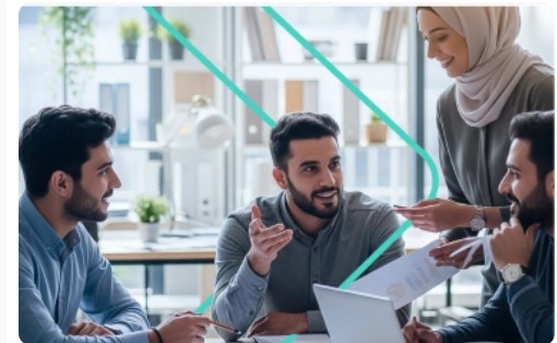 An accounting firm team reviewing documents together
